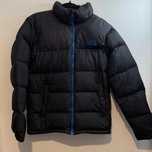 The North Face Black Puffer Jacket with Blue Zipper & Logo